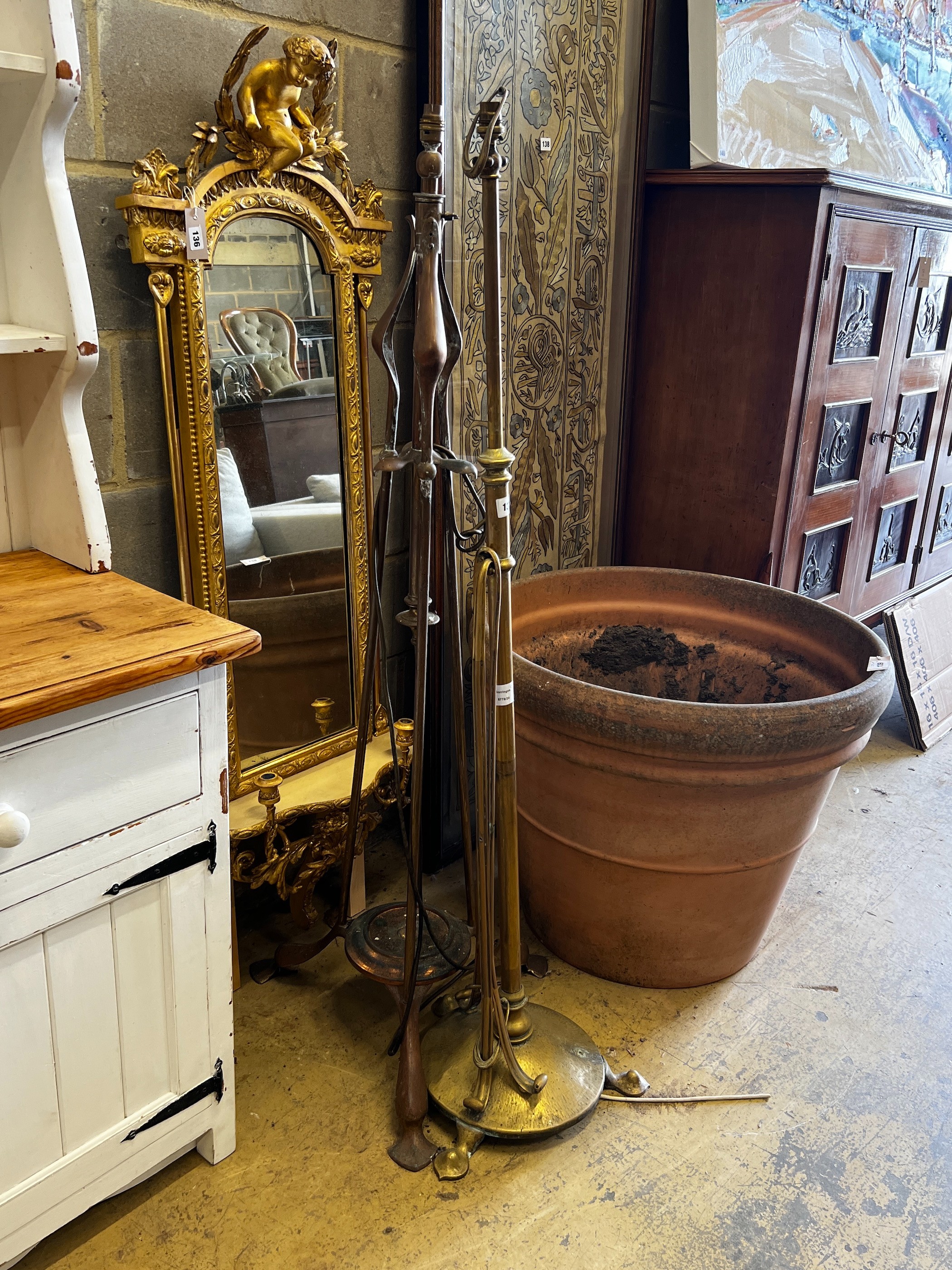 Two Art Nouveau copper and brass standard lamps